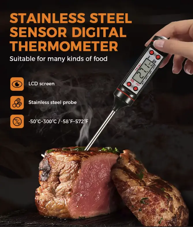 Digital meat thermometer measuring steak temperature